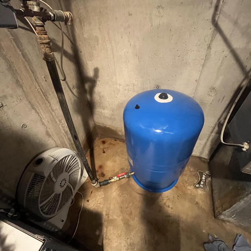 Well pressure tank with new installation in basement