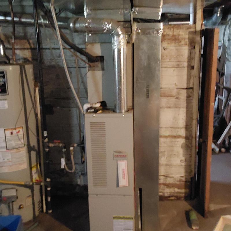 Trane furnace and ductwork in basement installation area