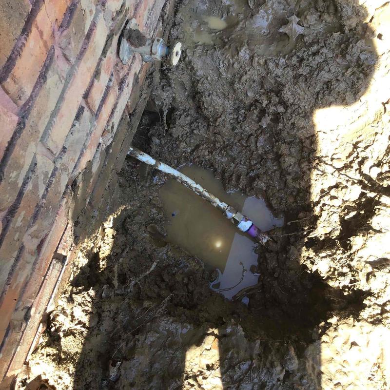 Water supply pipe leak detection and repair at foundation wall