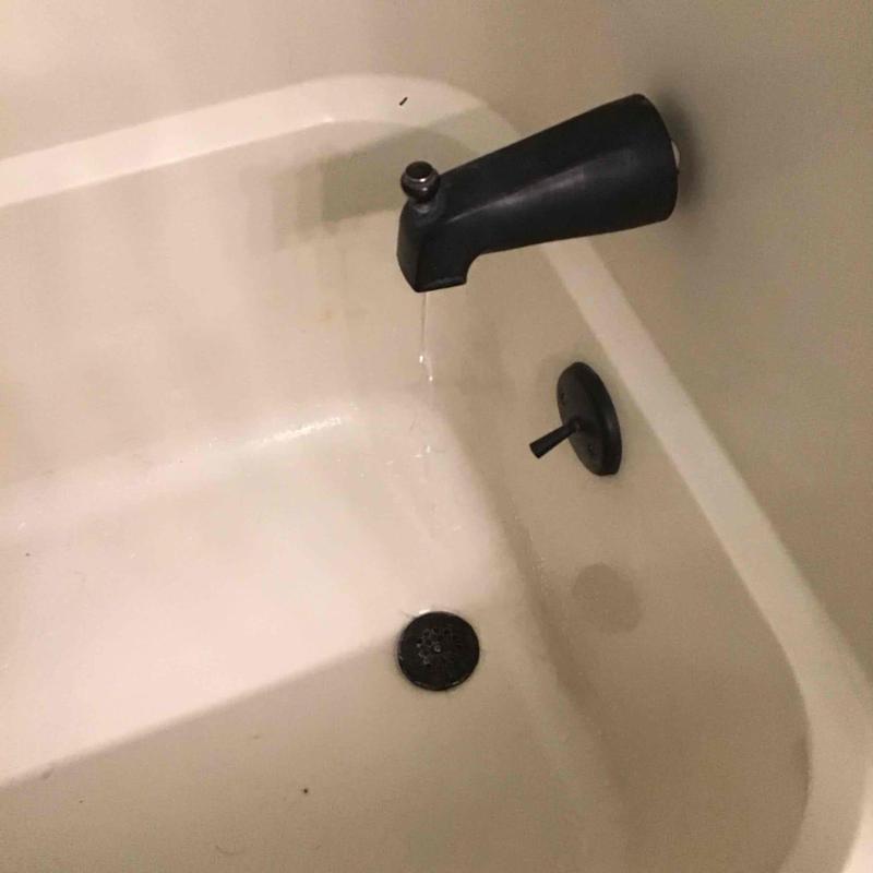 Shower valve and tub spout with water drip