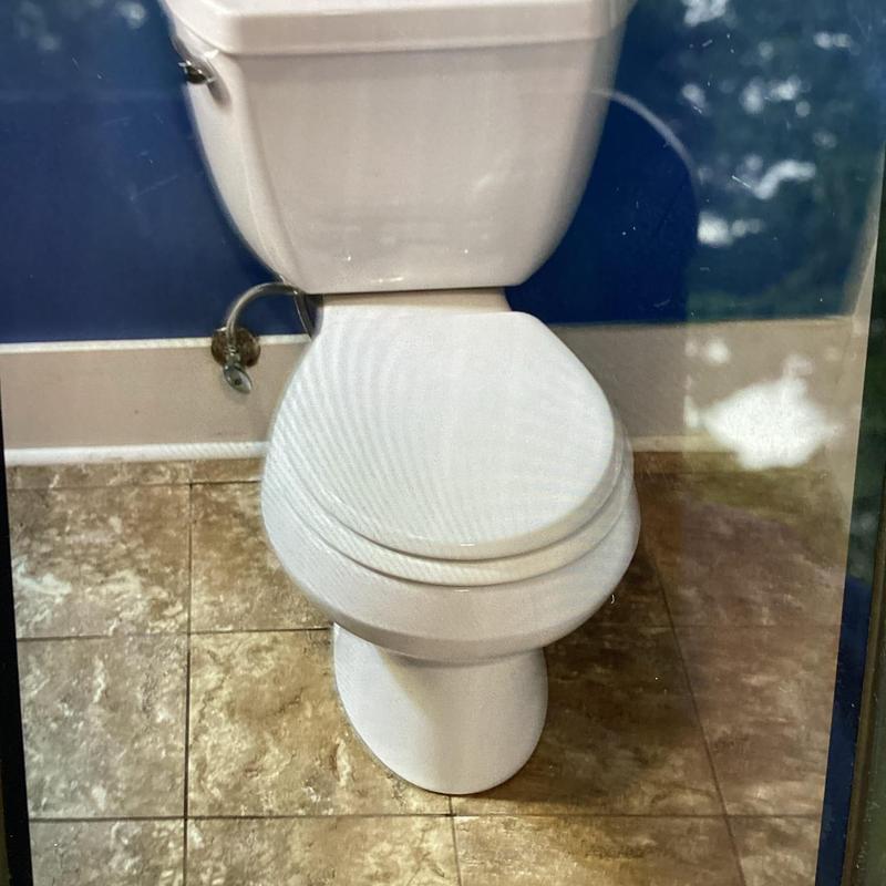 Toilet base with new wax ring installation
