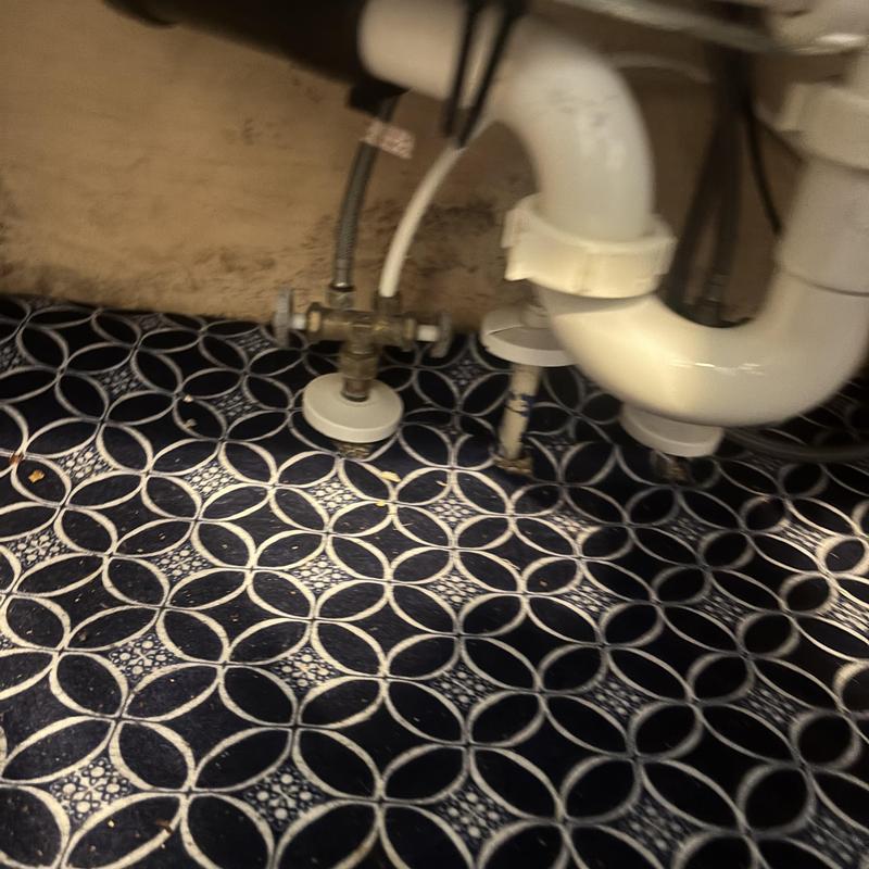 Kitchen sink emergency shutoff valves under sink