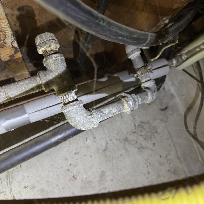 Galvanized water heater supply pipe with leaks Galvanized water heater supply pipe with leaks