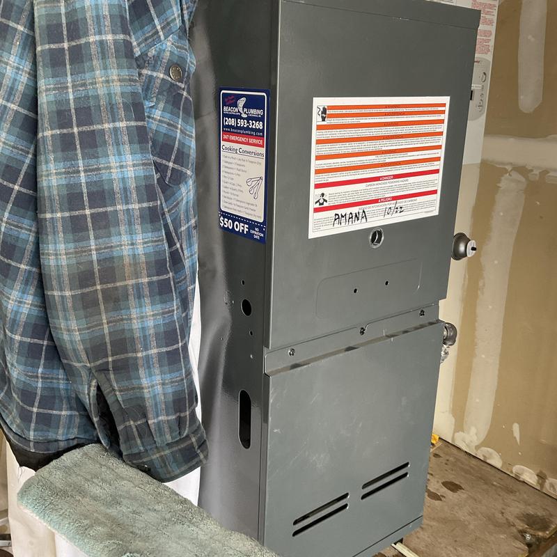 Tankless water heater unit with service tag Tankless water heater unit with service tag