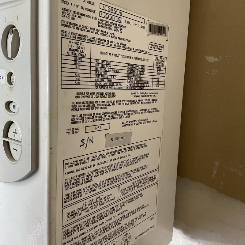 Tankless water heater control panel and label Tankless water heater control panel and label