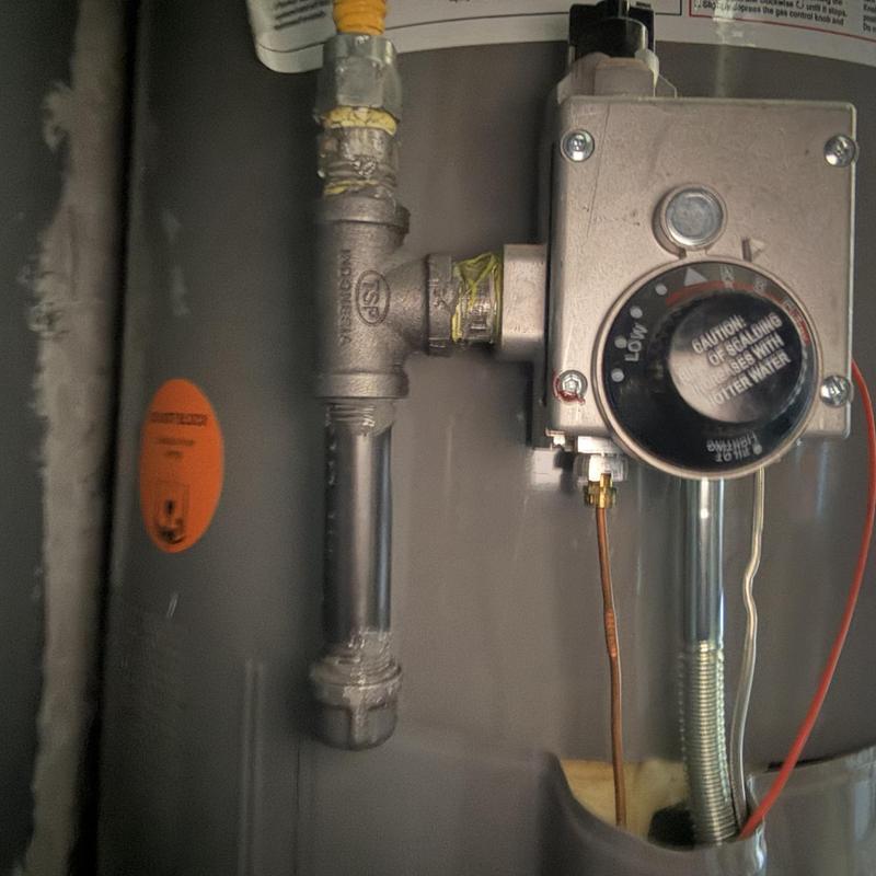 Drip leg and gas valve on water heater
