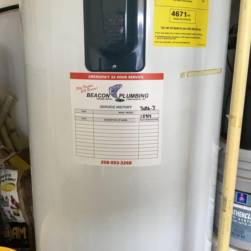 Water heater service history label on tank Water heater service history label on tank