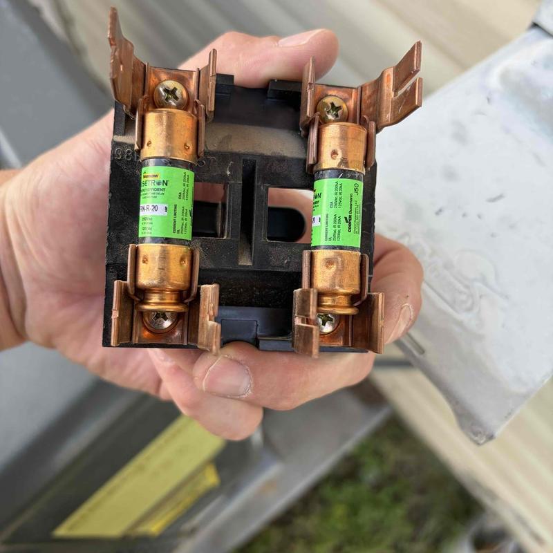 HVAC condenser fuse holder with fuses installed HVAC condenser fuse holder with fuses installed