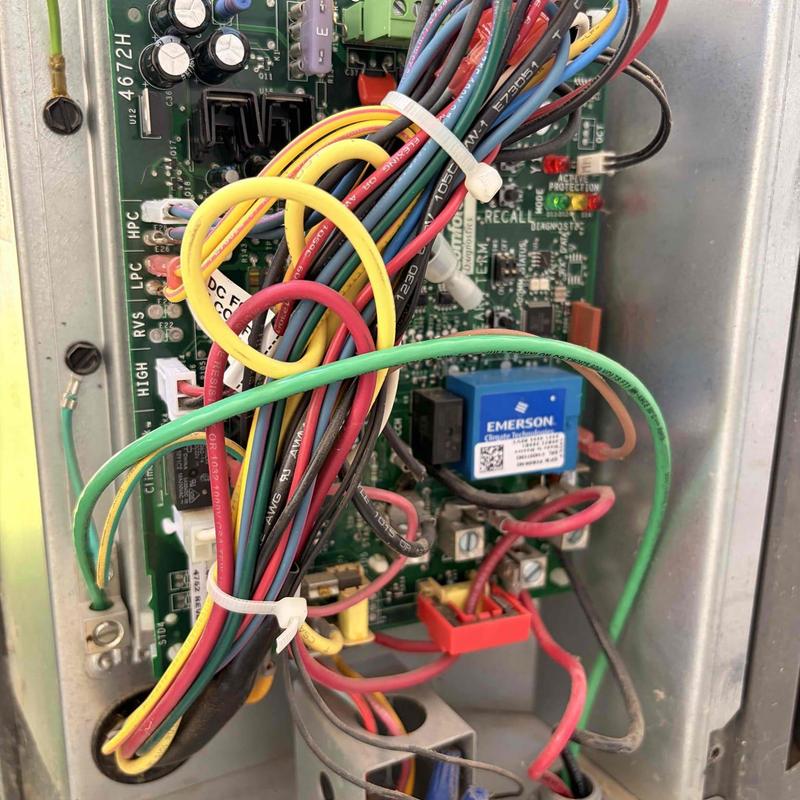 Furnace control board with multi-colored wiring connections Furnace control board with multi-colored wiring connections