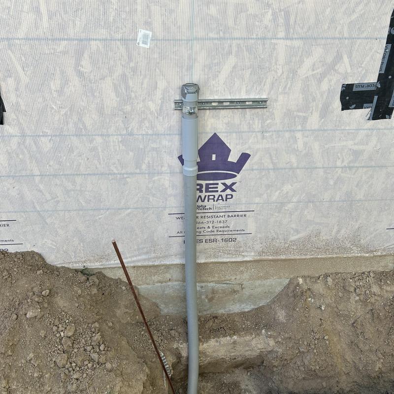 Underground electrical conduit installed at residential site Underground electrical conduit installed at residential site