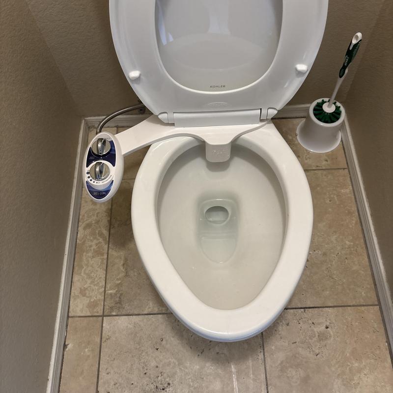 Bidet seat installation on toilet bowl