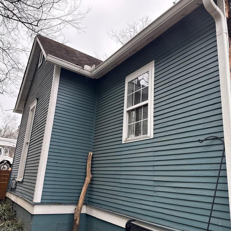 Vinyl siding exterior corner and window installation