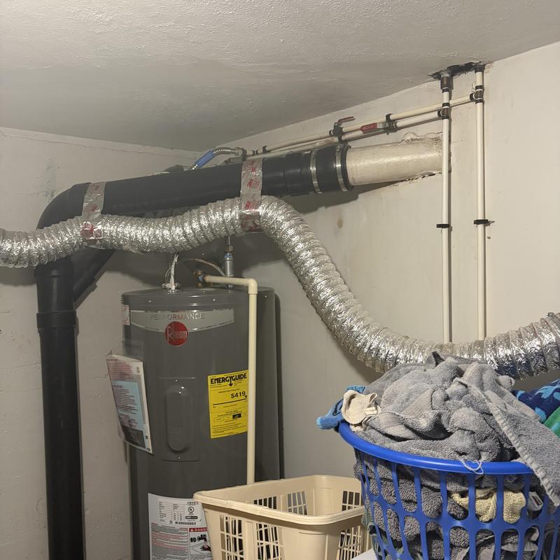 Water heater and ventilation ducting in utility room Water heater and ventilation ducting in utility room