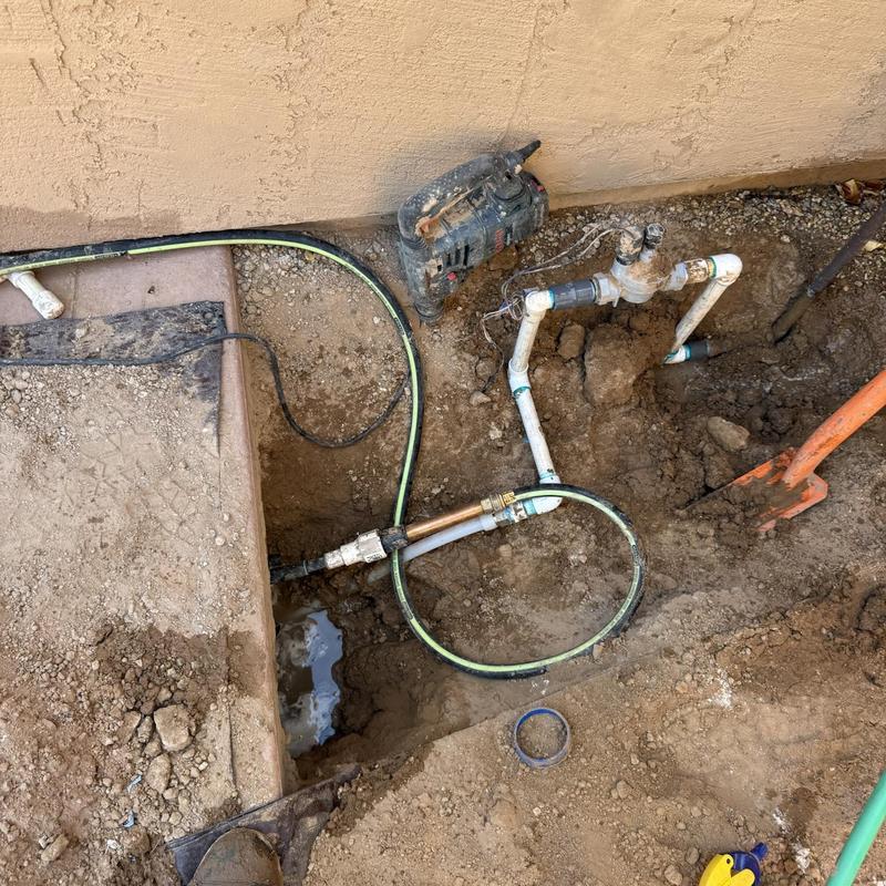 Water line and valve installation in ground trench