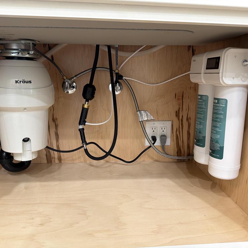 Garbage disposal and water filter installation under sink Garbage disposal and water filter installation under sink