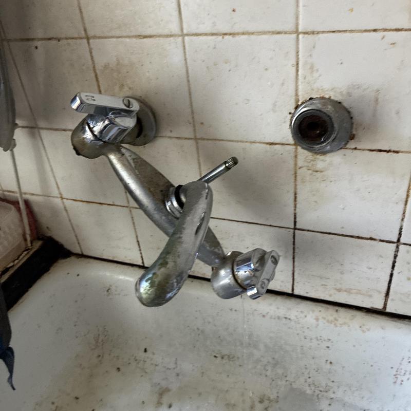 Kitchen faucet with leaking handle and missing spout