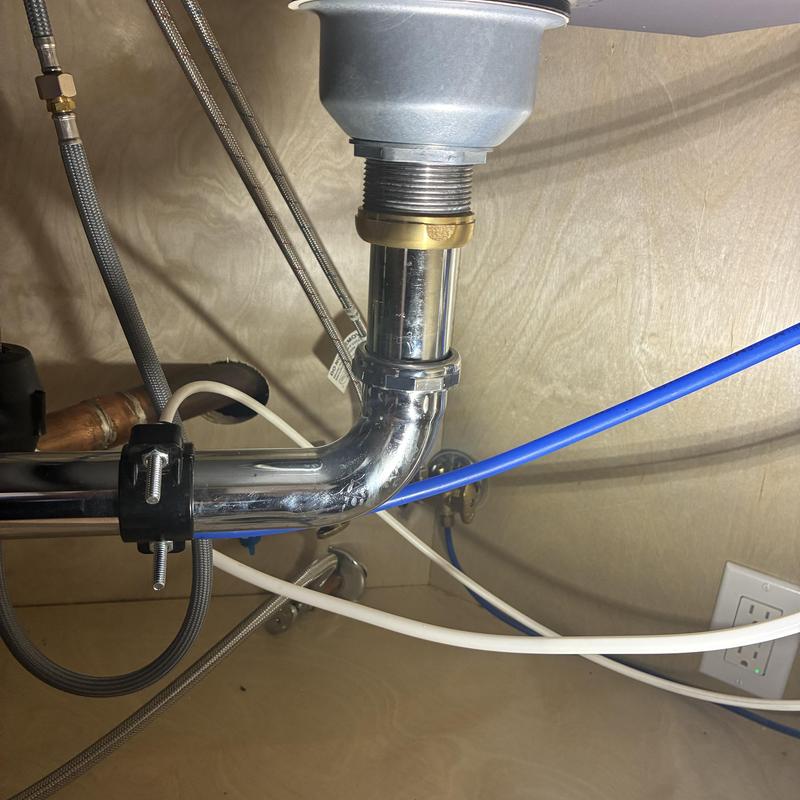Kitchen sink tailpiece and slip-joint nut assembly