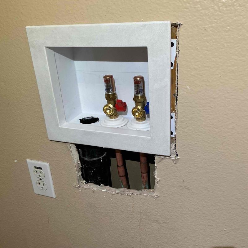 Laundry water valve connections with new valves installed