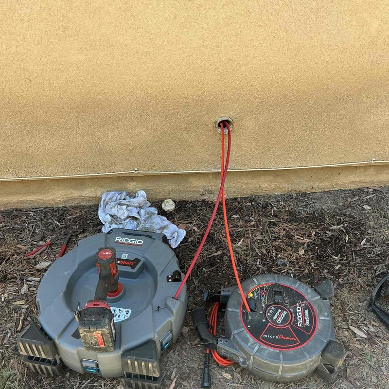 Branch line plumbing descaling and flushing tools outdoors