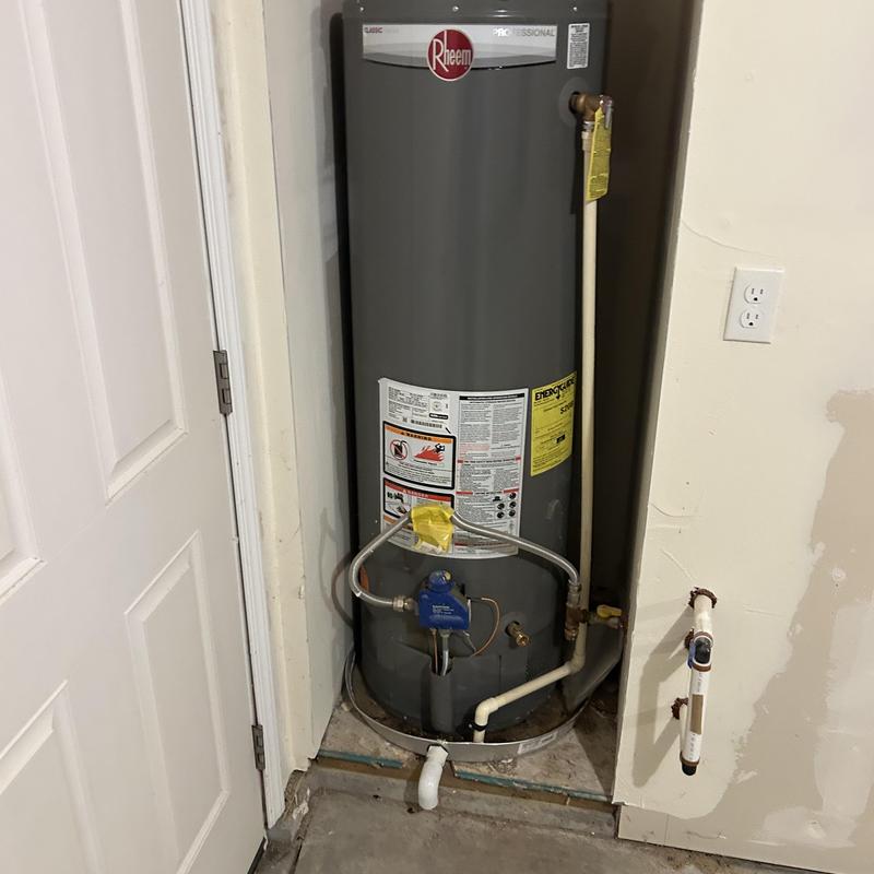 Rheem water heater with gas valve and pipes Rheem water heater with gas valve and pipes