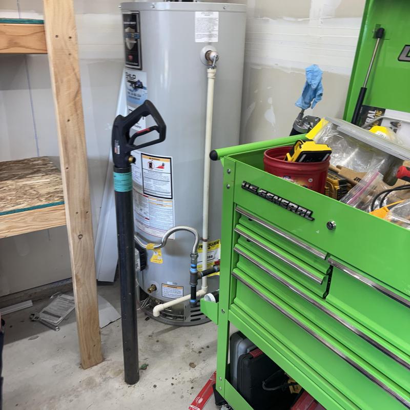 Water heater with tools and equipment nearby Water heater with tools and equipment nearby