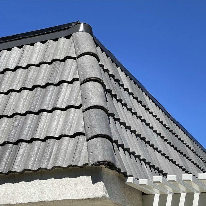 Tile roof and ridge cap inspection on residential building Tile roof and ridge cap inspection on residential building