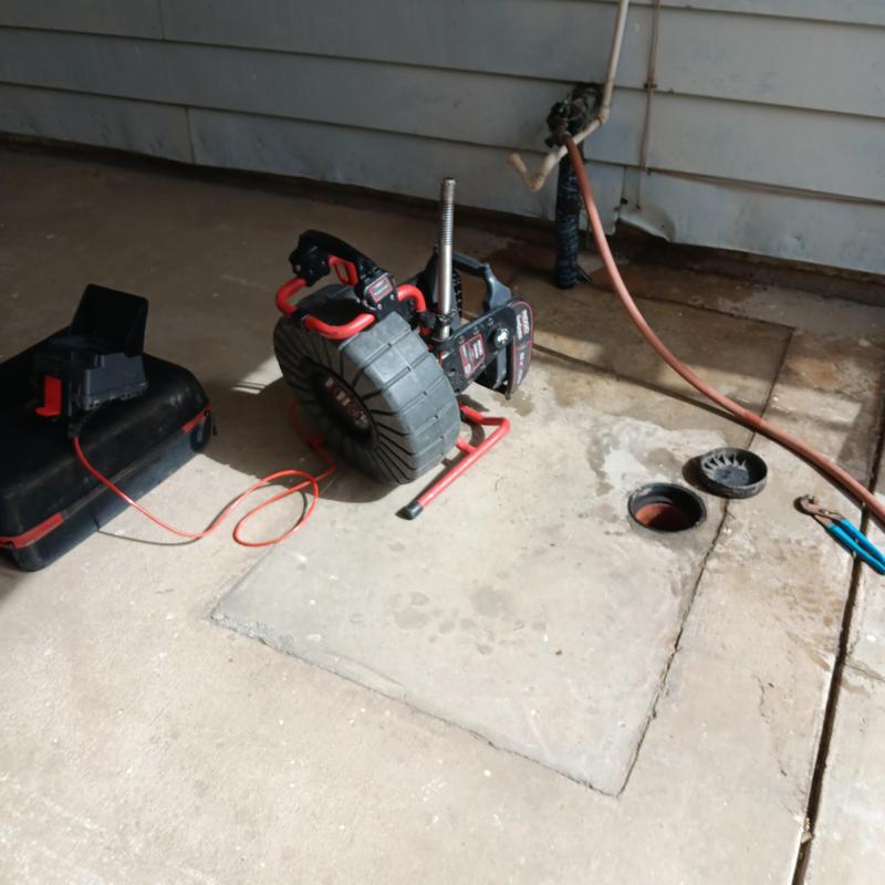 Sewer line hydrojetting with inspection camera and tools