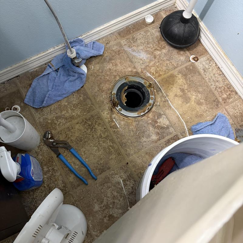 Toilet flange and plumbing pipe repair site in bathroom Toilet flange and plumbing pipe repair site in bathroom