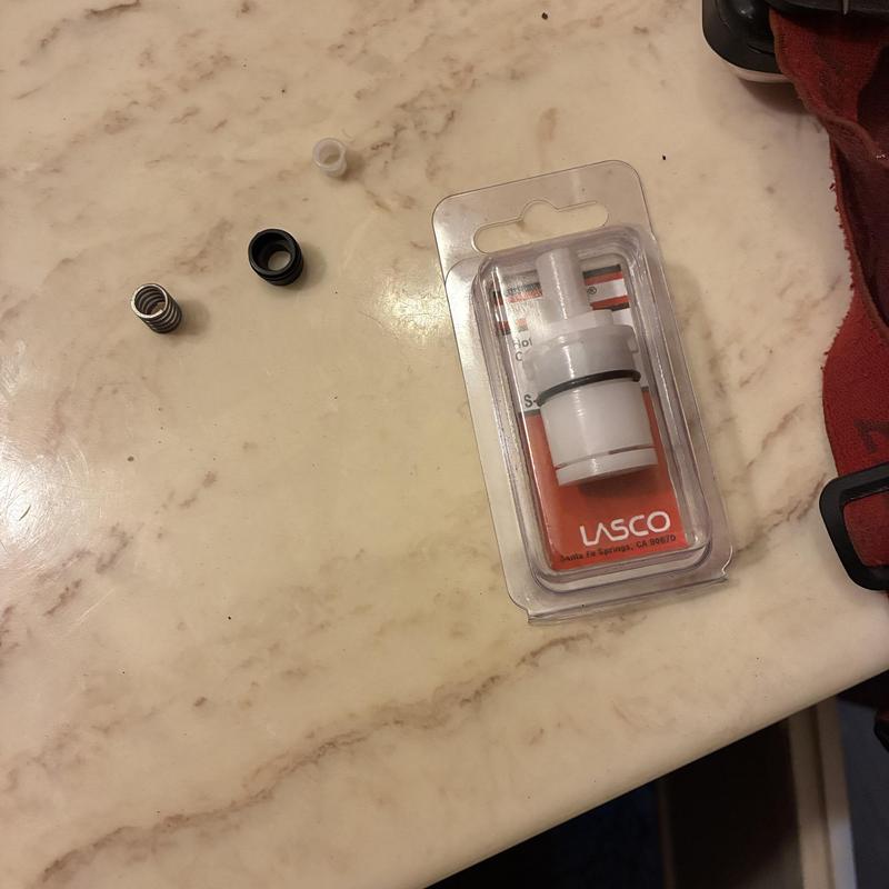 Shower cartridge replacement parts on countertop Shower cartridge replacement parts on countertop