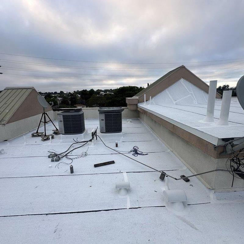 Flat roof membrane with HVAC units and vent pipes Flat roof membrane with HVAC units and vent pipes