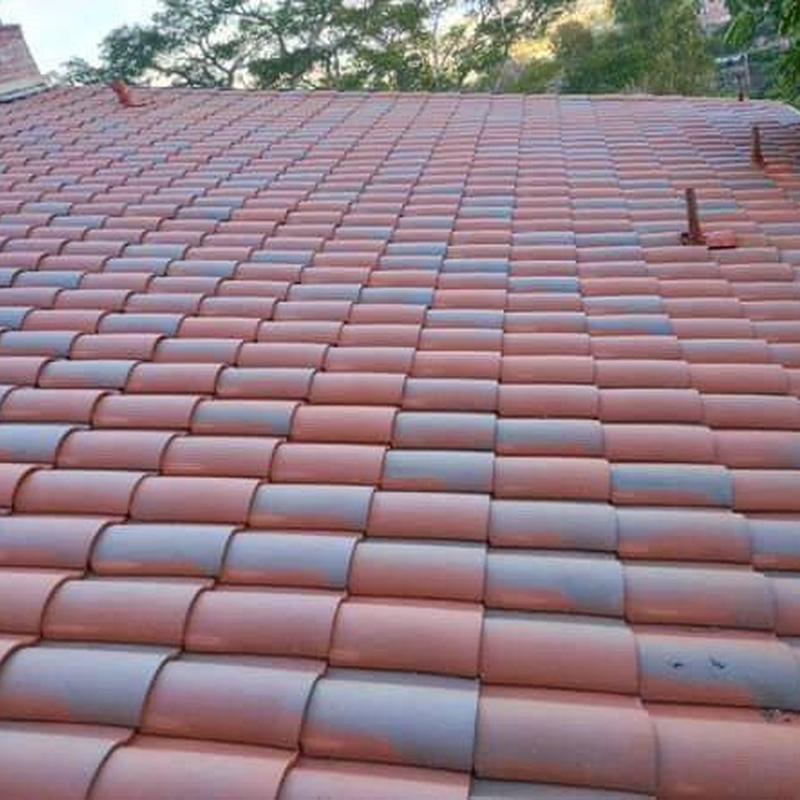 Tile roof with mixed new and aged tiles Tile roof with mixed new and aged tiles