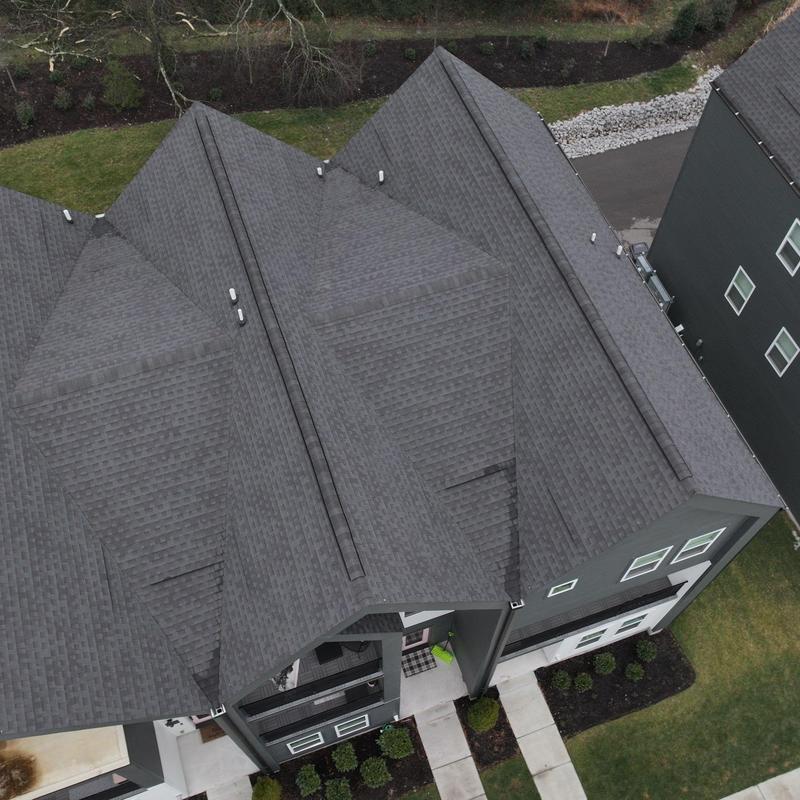 Asphalt shingle roof with hail damage inspection