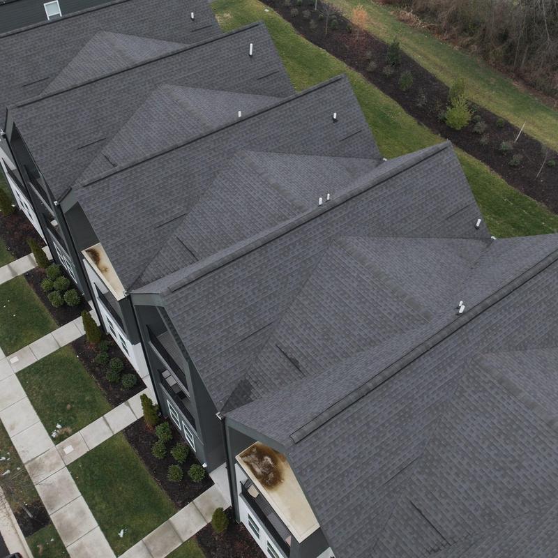 Asphalt shingle roof with vents and flashing inspection