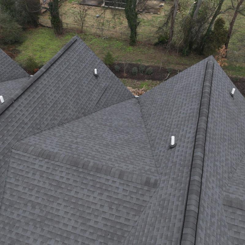 Architectural shingle roof with vents and ridges overview