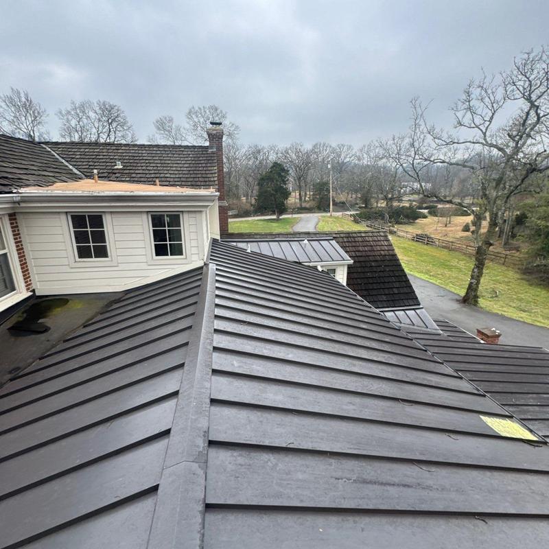 Metal standing seam roof with ridge detail