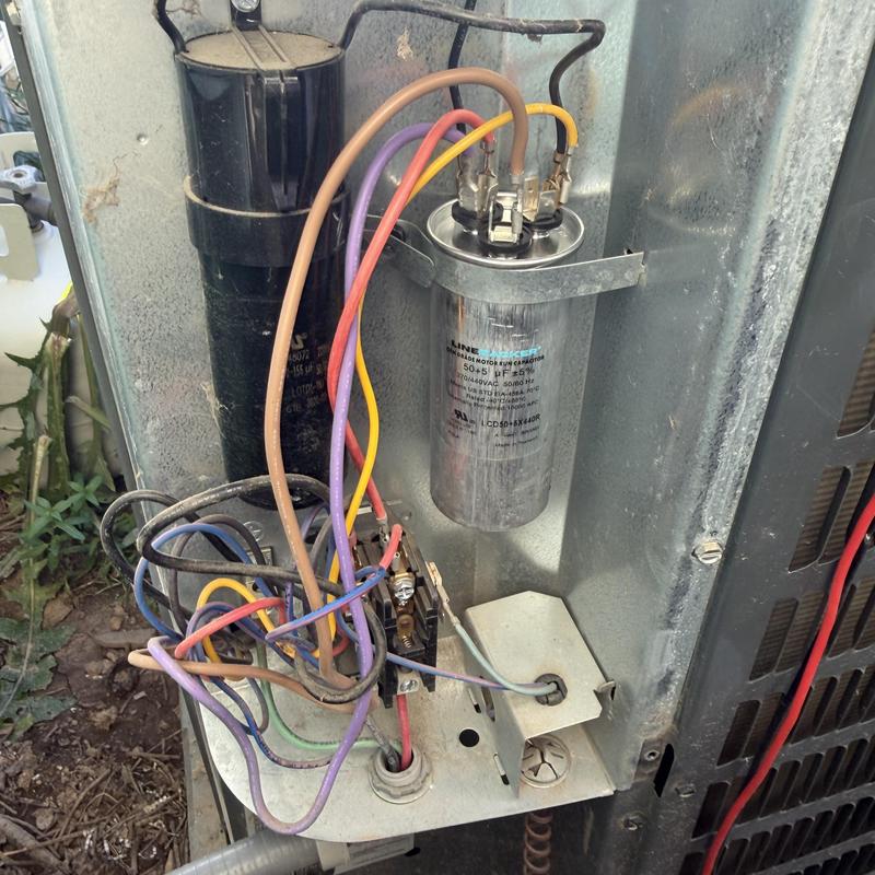 Outdoor AC run capacitor with wiring connections Outdoor AC run capacitor with wiring connections