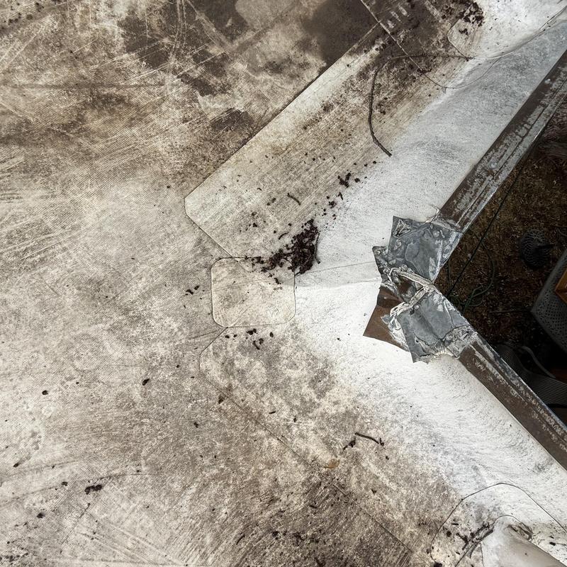 TPO membrane and metal roof edge damage on gravel roof TPO membrane and metal roof edge damage on gravel roof