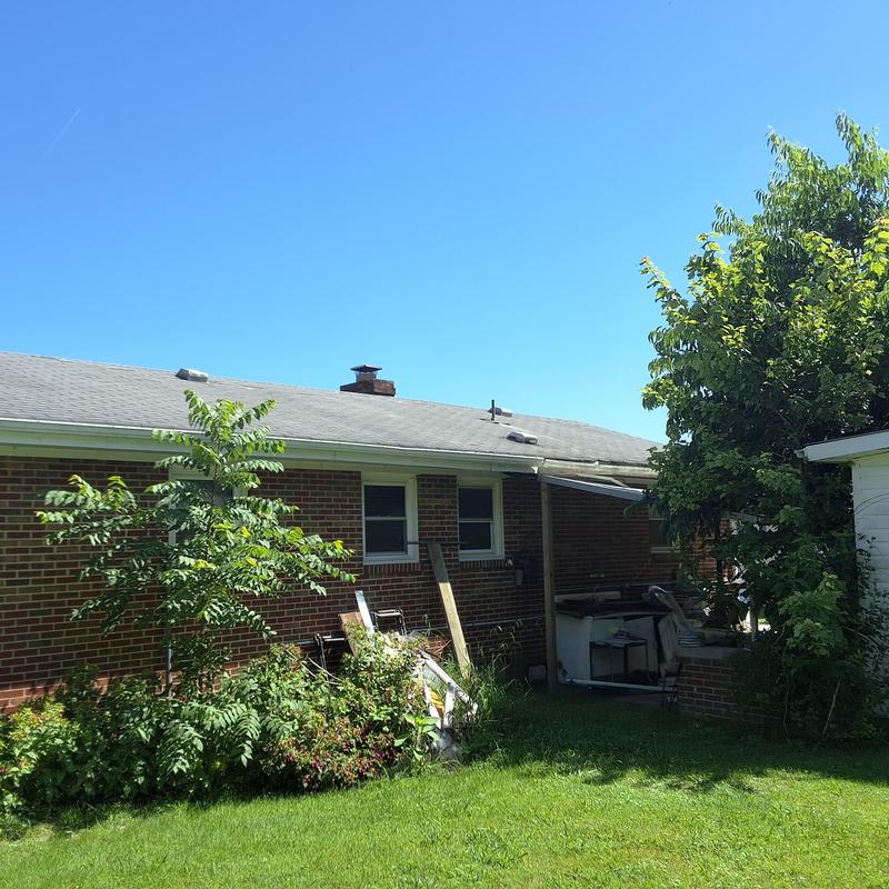 Asphalt shingle roof aged over 20 years with damage Asphalt shingle roof aged over 20 years with damage