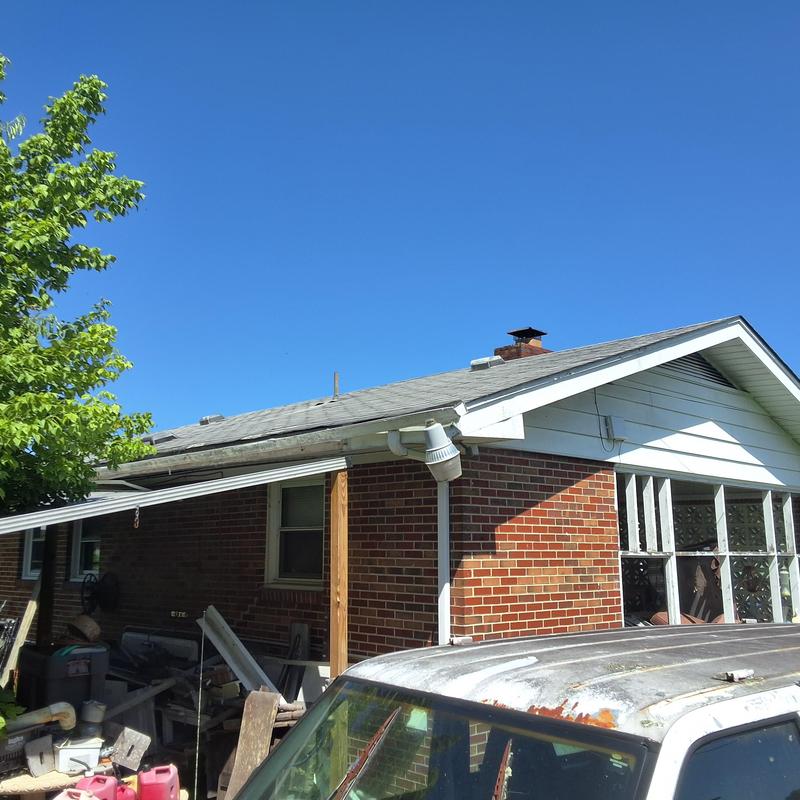 Asphalt shingle roof inspection with visible wear and damage Asphalt shingle roof inspection with visible wear and damage