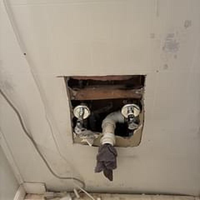 Shut off valves and drain pipe in master bath wall cavity