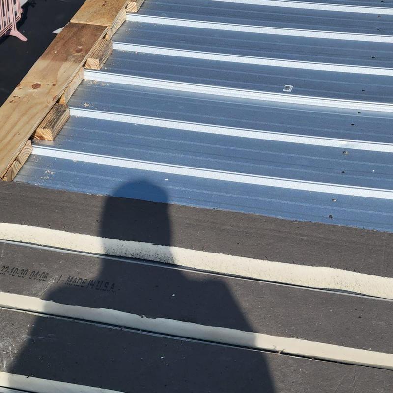 TPO roofing membrane with metal deck and wood supports TPO roofing membrane with metal deck and wood supports