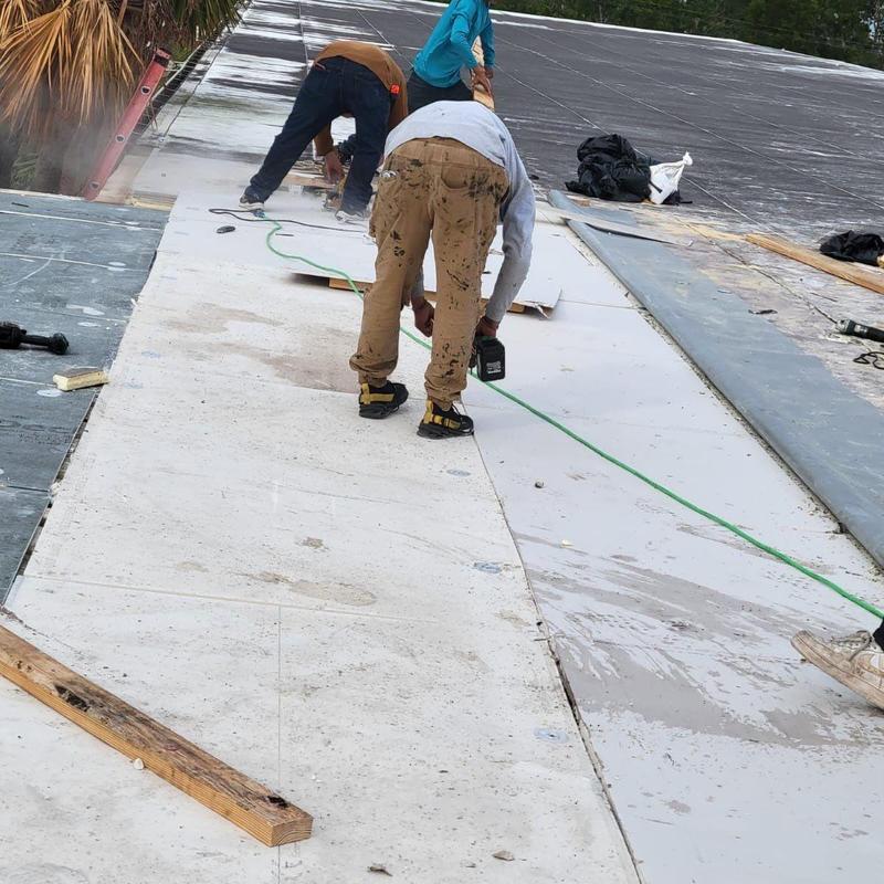 TPO flat roof membrane installation on commercial roof TPO flat roof membrane installation on commercial roof