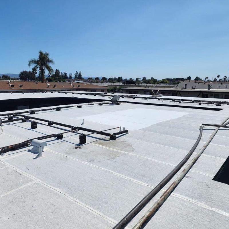 Commercial flat roof membrane inspection and piping mounts Commercial flat roof membrane inspection and piping mounts