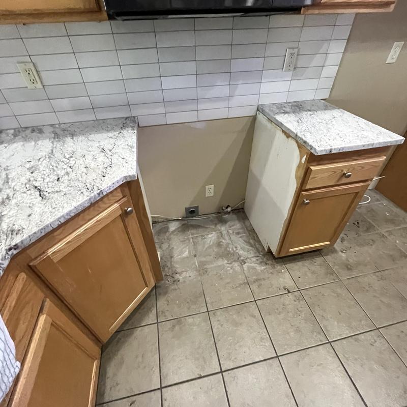 Kitchen countertop area cleared for appliance removal Kitchen countertop area cleared for appliance removal