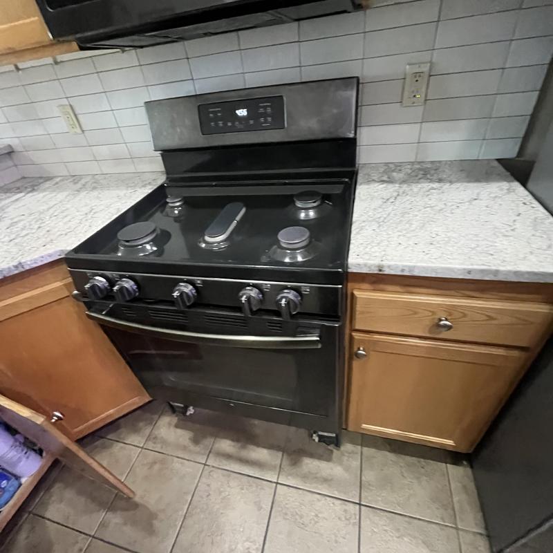 Gas stove removal for countertop sealing in kitchen Gas stove removal for countertop sealing in kitchen