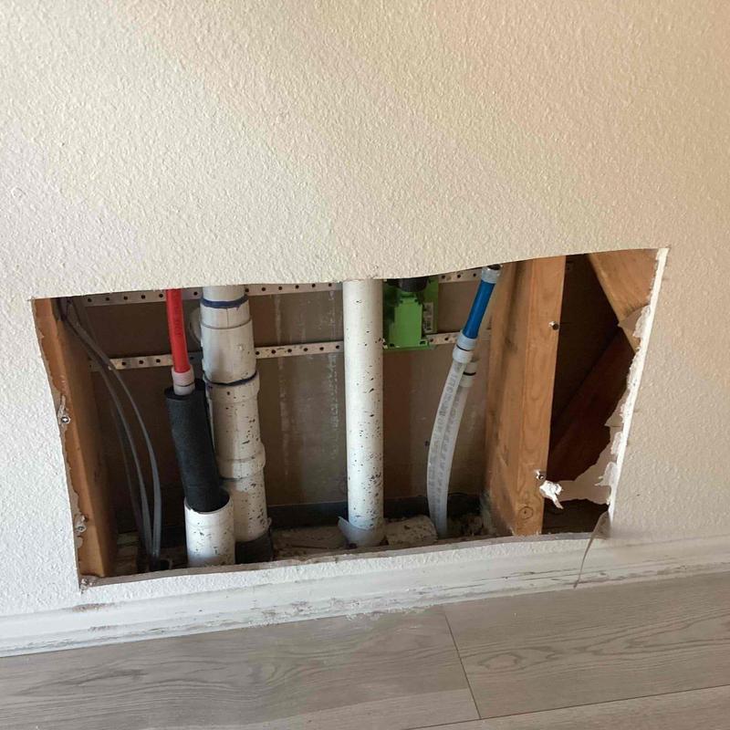Cold water line reroute inside wall cavity with piping