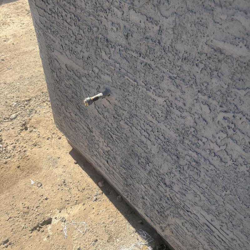 Hose bib pipe protruding from exterior stucco wall Hose bib pipe protruding from exterior stucco wall