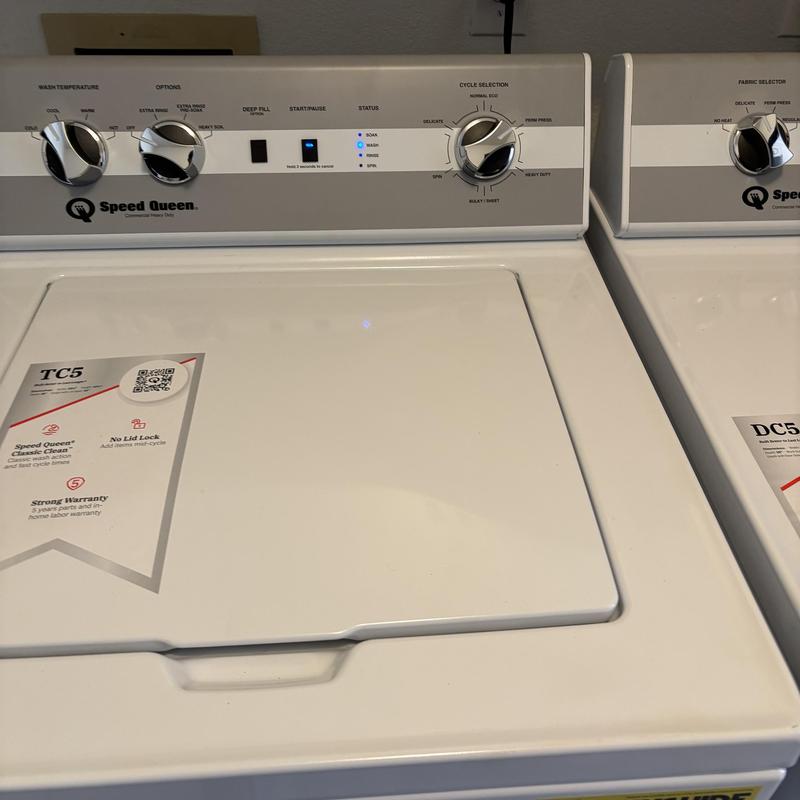 Washing machine control panel and lid close-up