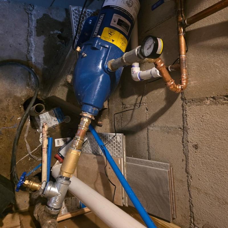 Shallow jet pump with tee and boiler drain installation