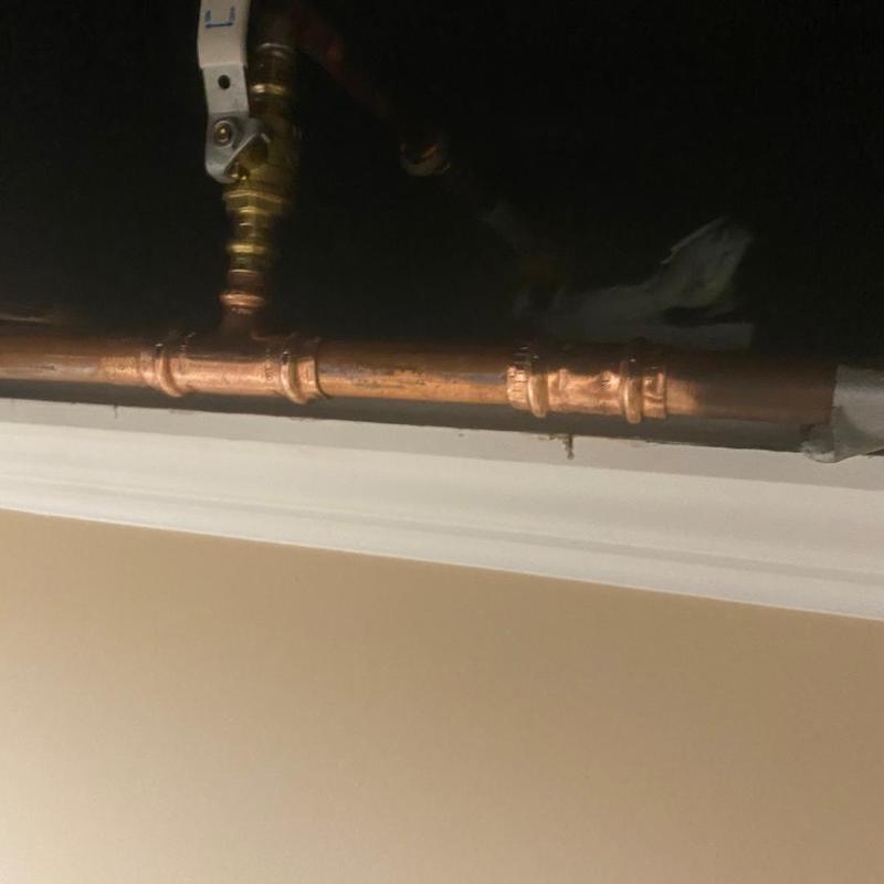 Copper water pipes with shut off valves installed Copper water pipes with shut off valves installed